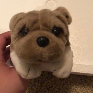 Tan and cream small stuffed dog